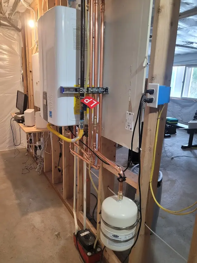 Licensed plumber repairing a kitchen sink in Jefferson