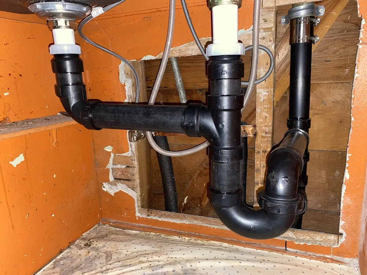 Professional Garbage Disposal Repair equipment and tools on the job in Jefferson